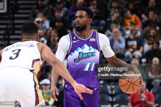 Mike Conley of the Utah Jazz dribbles the ball against the New Orleans Pelicans on DECEMBER 15, 2022 at vivint.SmartHome Arena in Salt Lake City,...