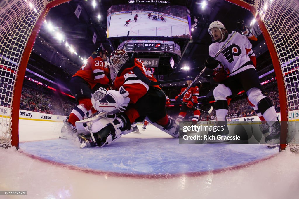 Devils Flyers Vitek Vanecek of the New Jersey Devils defends his net against Travis ...