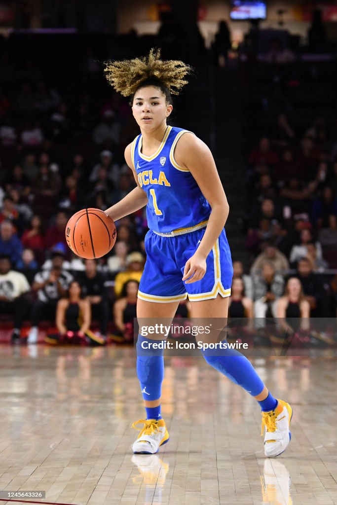 Kiki Rice Injury Bruins guard Kiki Rice dribbles up the court during the womens... News ...