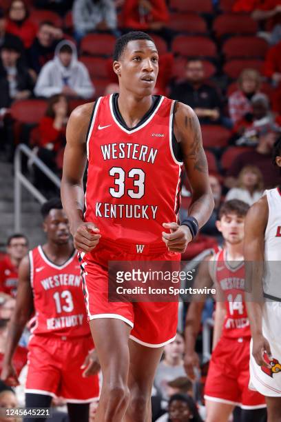 Western Kentucky Hilltoppers center Jamarion Sharp looks on during a college basketball game against the Louisville Cardinals on December 14, 2022 at...