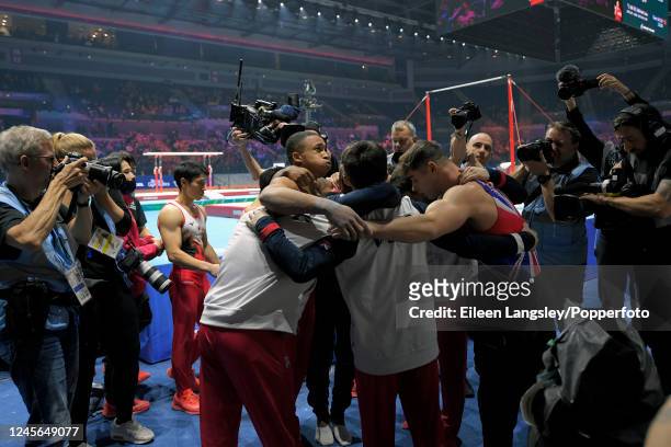 Great Britain celebrate winning the bronze medal and thus automatic qualification to the 2024 Summer Olympics, following the men's team final during...