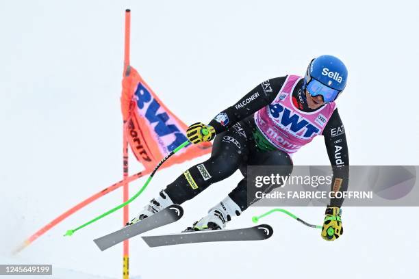 Italy's Elena Curtoni competes in the third run of the Women's Downhill event during the FIS Alpine Ski World Cup in Saint-Moritz on December 16,...