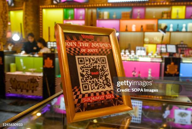 Close up view of a QR code weed menu at the Wonderland weed outlet on Sukhumvit Road. In the metropolitan area of Bangkok 1995 marijuana...