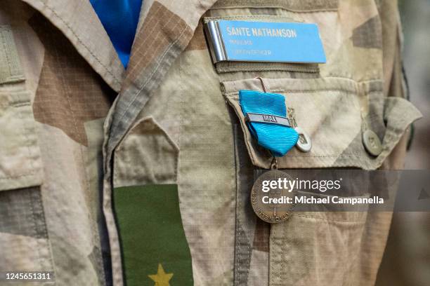 Soldiers participate in a medal ceremony for Swedish soldiers who served in the U.N. Peace keeping mission in Mali at Royal Tennis Hall on December...