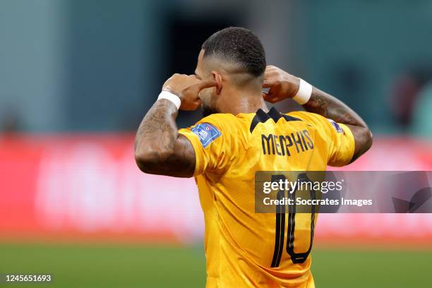 Memphis Depay of Holland celebrates 1-0 during the World Cup match between Holland v USA at the Khalifa International Stadium on December 3, 2022 in...