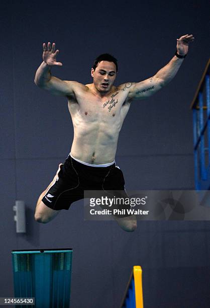 Zac Guildford of the All Blacks dives during a New Zealand All Blacks IRB Rugby World Cup 2011 recovery session at the Waterworld Aquatic Centre on...