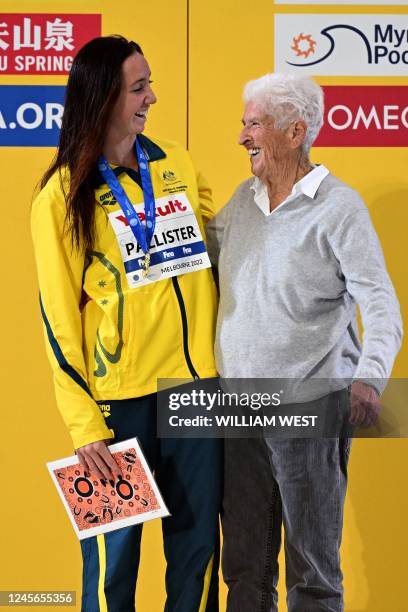 Gold medallist Lani Pallister of Australia poses with former Australian freestyle swimmer Dawn Fraser after winning the Women's 1500m Freestyle final...