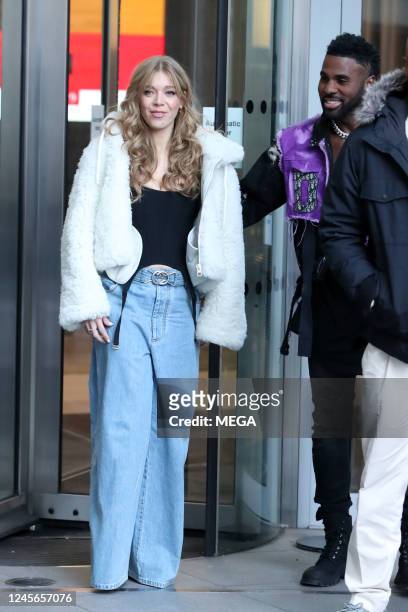 Jason Derulo and Becky Hill are seen leaving BBC HQ on December 15 2022 in London, England.
