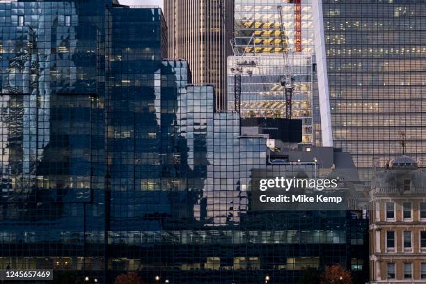 Northern & Shell building and 20 Fenchurch Street, affectionately nicknamed the Walkie Talkie in early evening light on 7th December 2022 in London,...