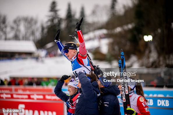 Sophie Chauveau of France is celebrated by the team at the finish