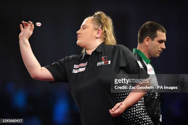 England's Beau Greaves in action against Ireland's William OâConnor during day two of the Cazoo World Darts Championship at Alexandra Palace, London....