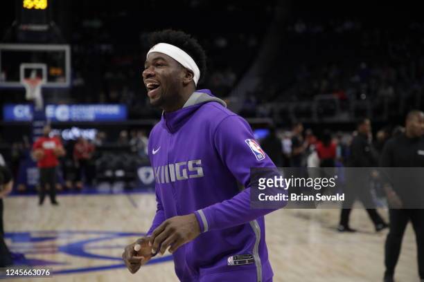 Terence Davis of the Sacramento Kings smiles before the game against the Detroit Pistons on December 16, 2022 at Little Caesars Arena in Detroit,...