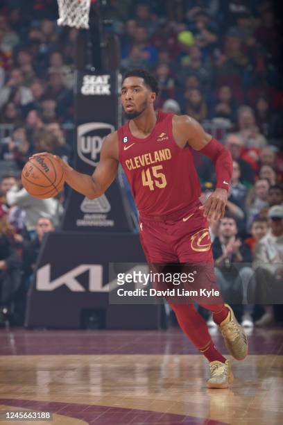 Donovan Mitchell of the Cleveland Cavaliers dribbles the ball during the game against the Indiana Pacers on December 16, 2022 at Rocket Mortgage...