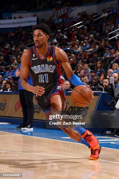 Aaron Wiggins of the Oklahoma City Thunder dribbles the ball during the game against the Minnesota Timberwolves on December 16, 2022 at Paycom Arena...