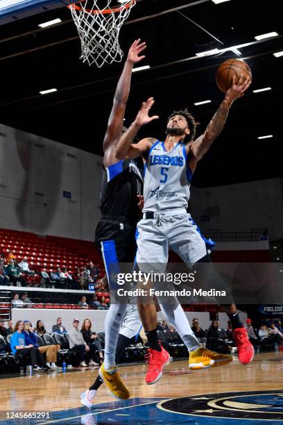 Tyler Dorsey of the Texas Legends goes for a layup against Simi Shittu of the Lakeland Magic during the game on December 16, 2022 at RP Funding...