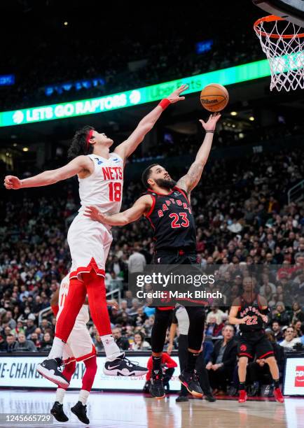 Fred VanVleet of the Toronto Raptors goes to the basket against Yuta Watanabe of the Brooklyn Nets during the second half of their basketball game at...