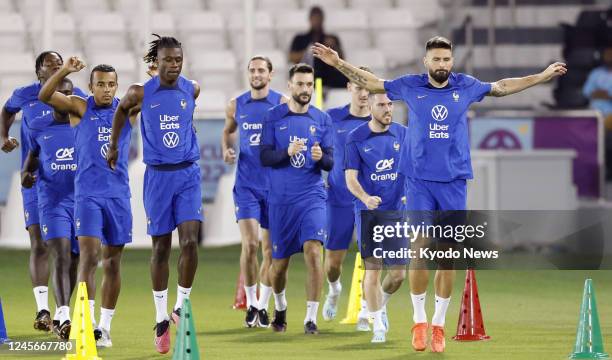 France players warm up during a training session in Doha, Qatar, on Dec. 16 two days before the football World Cup final against Argentina.
