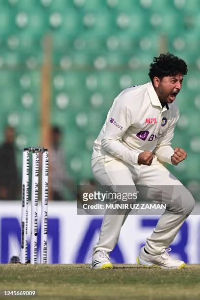 Indias Kuldeep Yadav reacts after the dismissal of Bangladesh's Litton Das during the fourth day of the first cricket Test match between Bangladesh...
