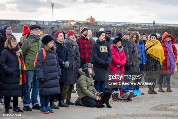 Local residents gathered to say No More Deaths on Sunny Sands Beach, on 17th December 2022 in Folkestone, Kent, United Kingdom. This vigil was...