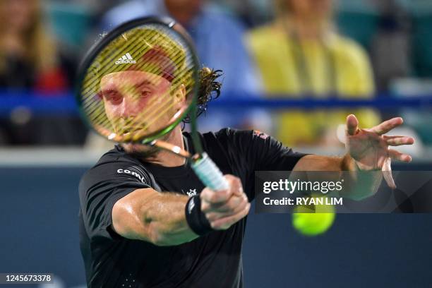 Greece's player Stefanos Tsitsipas returns the ball to Norway's player Casper Ruud during the semi-final of UAE's Mubadala World Tennis Championship,...