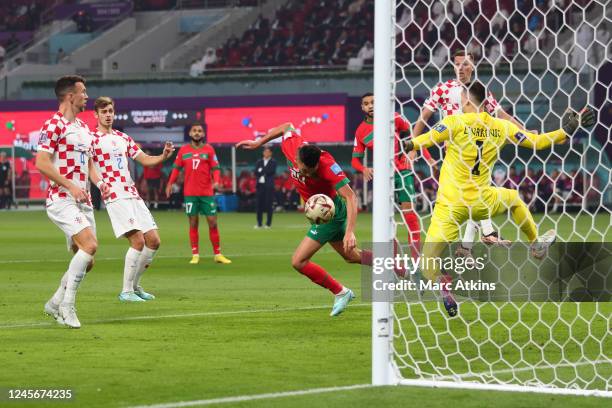 Achraf Dari of Morocco scores a goal 1-1 during the FIFA World Cup Qatar 2022 3rd Place match between Croatia and Morocco at Khalifa International...