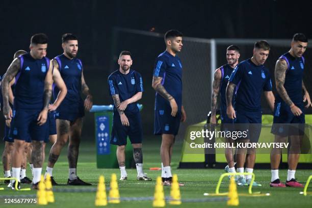 Argentina's forward Lionel Messi takes part in a training session at Qatar University training site 3 in Doha on December 17 on the eve of the Qatar...