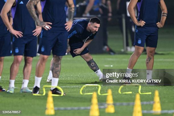 Argentina's forward Lionel Messi takes part in a training session at Qatar University training site 3 in Doha on December 17 on the eve of the Qatar...