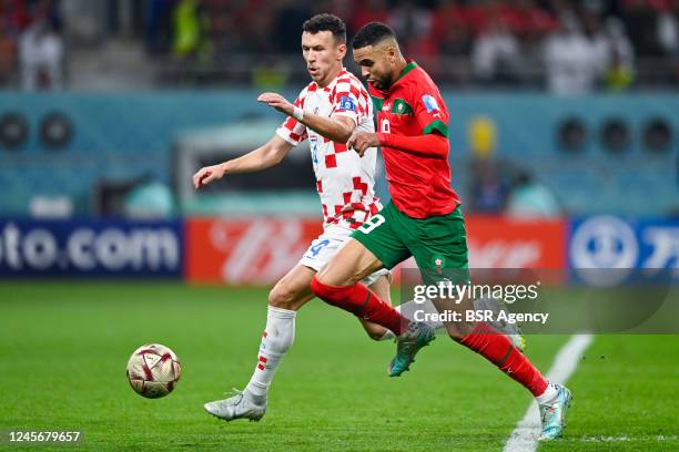 Ivan Perisic of Croatia battles for the ball with Youssef En Nesyri of Morocco during the 3rd Place - FIFA World Cup Qatar 2022 match between Croatia...