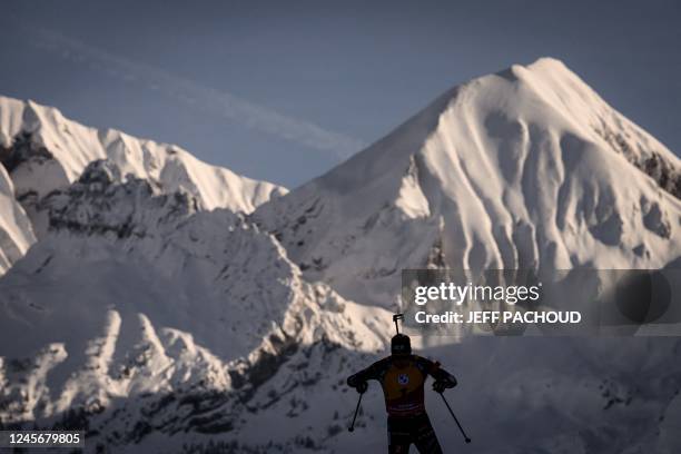 Norwegian biathlete Johannes Thingnes Boe competes in the mens 12,5 km pursuit event of the IBU Biathlon World Cup in Le Grand Bornand near Annecy,...