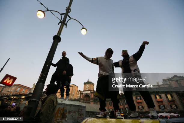 People dance and sing on dumpsters, during the national demonstration "Street Parade", in Naples, against the repressive law decree on Rave Parties,...