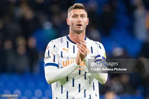 Gary Madine of Blackpool applauds the supporters during the Sky Bet Championship match between Cardiff City and Blackpool at the Cardiff City Stadium...
