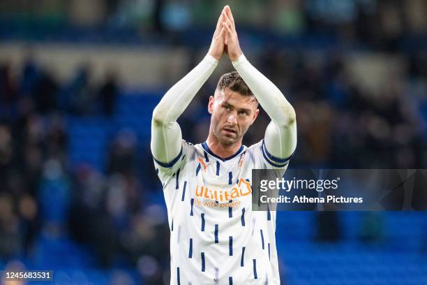 Gary Madine of Blackpool applauds the supporters during the Sky Bet Championship match between Cardiff City and Blackpool at the Cardiff City Stadium...
