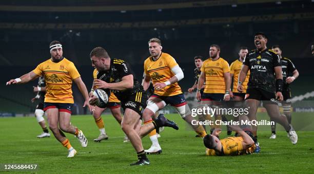 Pierre Bourgarit of La Rochelle scores his sides third try during the Champions Cup game versus Ulster at Aviva Stadium on December 17, 2022 in...