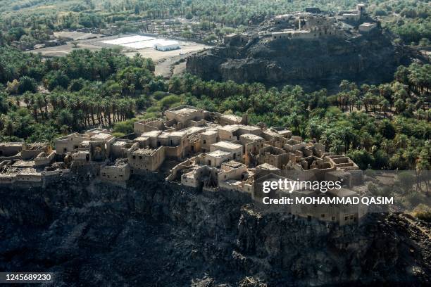 This picture taken on December 12, 2022 shows an aerial view of an old fort in the Khaybar oasis in northwestern Saudi Arabia. - Khaybar, best known...