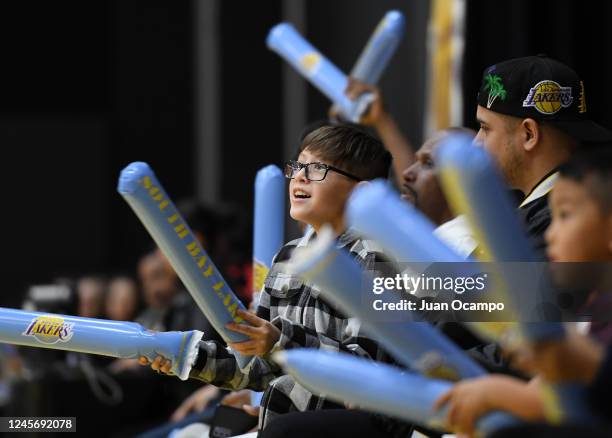 Young fan uses his thunder sticks during the game between the Stockton Kings and the South Bay Lakers on December 17, 2022 at UCLA Health Training...