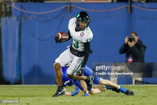 North Texas Mean Green defensive back Logan Wilson makes an interception during the Frisco Bowl between the North Texas Mean Green and the Boise...