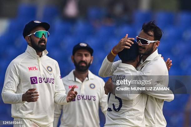 India's cricketers celebrate their win in the first cricket Test match between Bangladesh and India at the Zahur Ahmed Chowdhury Stadium in...