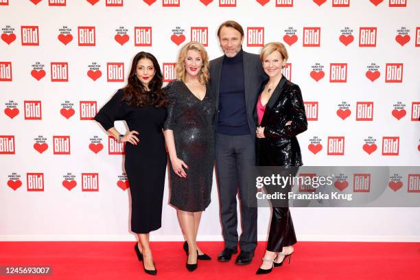 Arzu Bazman, Alexa Maria Surholt, Bernhard Bettermann and Andrea Kathrin Loewig during the "Ein Herz fuer Kinder" Gala at Studio Berlin Adlershof on...