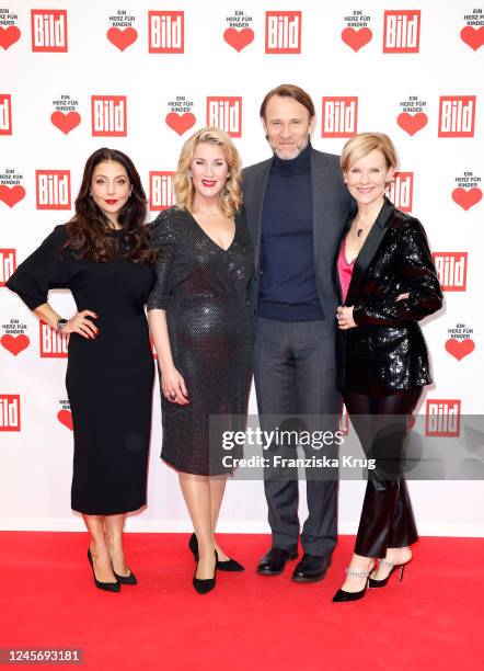 Arzu Bazman, Alexa Maria Surholt, Bernhard Bettermann and Andrea Kathrin Loewig during the "Ein Herz fuer Kinder" Gala at Studio Berlin Adlershof on...