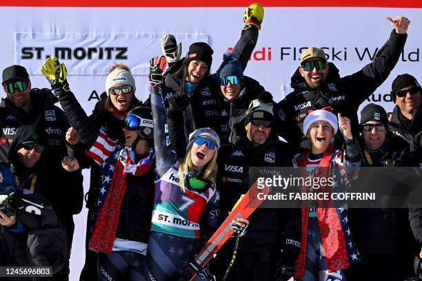 Mikaela Shiffrin celebrates with her team after winning the second Super-G of the FIS alpine skiing Women's World Cup event in Saint Moritz, Swiss...