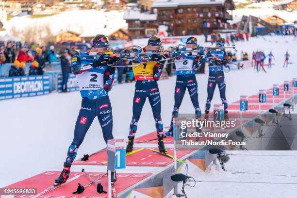 Johannes Thingnes Boe of Norway takes third place, Sturla Holm Laegreid of Norway takes second place during the Men 15 km Mass Start at the BMW IBU...