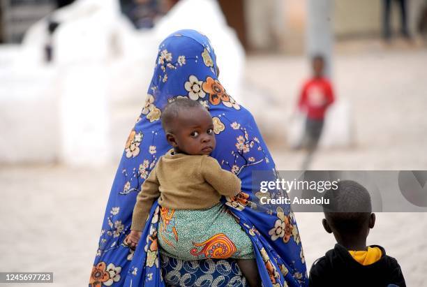 An African immigrant child is seen ahead of the International Migrants Day as daily life continues in Gardaya, Algeria on December 11, 2022....