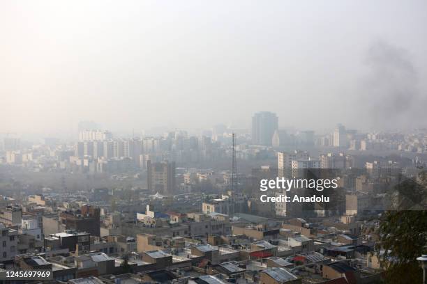 General view of the city turning gray due to the high levels of air pollution in Tehran, Iran on December 18, 2022. Air pollution is "unhealthy for...