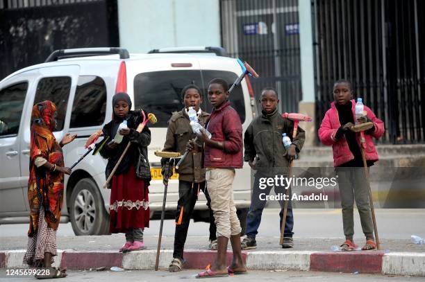 African migrants are seen ahead of the International Migrants Day as daily life continues in Blida, Algeria on December 17, 2022. Proclaimed by the...