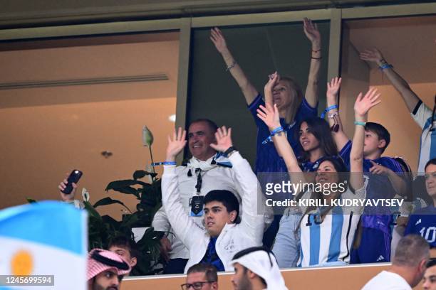 Argentina's forward Lionel Messi's wife Antonela Roccuzzo , mother Celia Maria Cuccittini and son Mateo cheer on the stands ahead of the start of the...