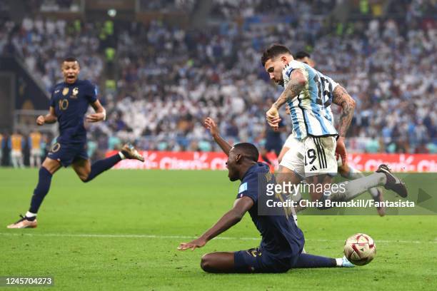Nicolas Otamendi of Argentina fouls Randal Kolo Muani of France which leads to a penalty for France during the FIFA World Cup Qatar 2022 Final match...