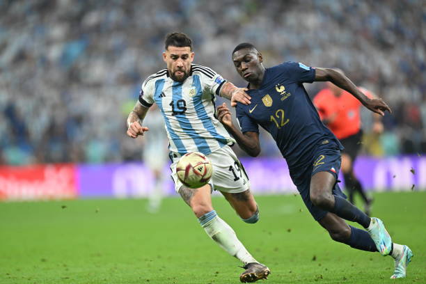 Nicolas Otamendi of Argentina in action against Randal Kolo Muani of France during the FIFA World Cup 2022 Final Match between Argentina and France...