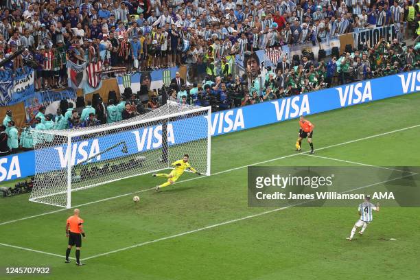 Gonzalo Montiel of Argentina scores the winning penalty during the penalty shoot out to win the FIFA World Cup for Argentina during the FIFA World...