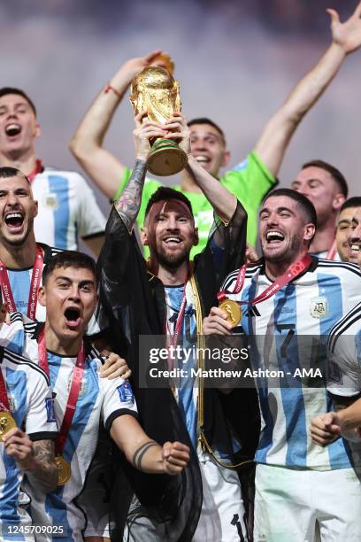 Lionel Messi of Argentina lifts the FIFA World Cup Trophy after winning the FIFA World Cup Qatar 2022 during the FIFA World Cup Qatar 2022 Final...