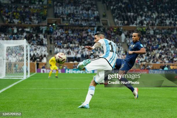 Angel Di Maria right winger of Argentina and Juventus FC competes for the ball with Jules Kounde centre-back of France and FC Barcelona during to the...